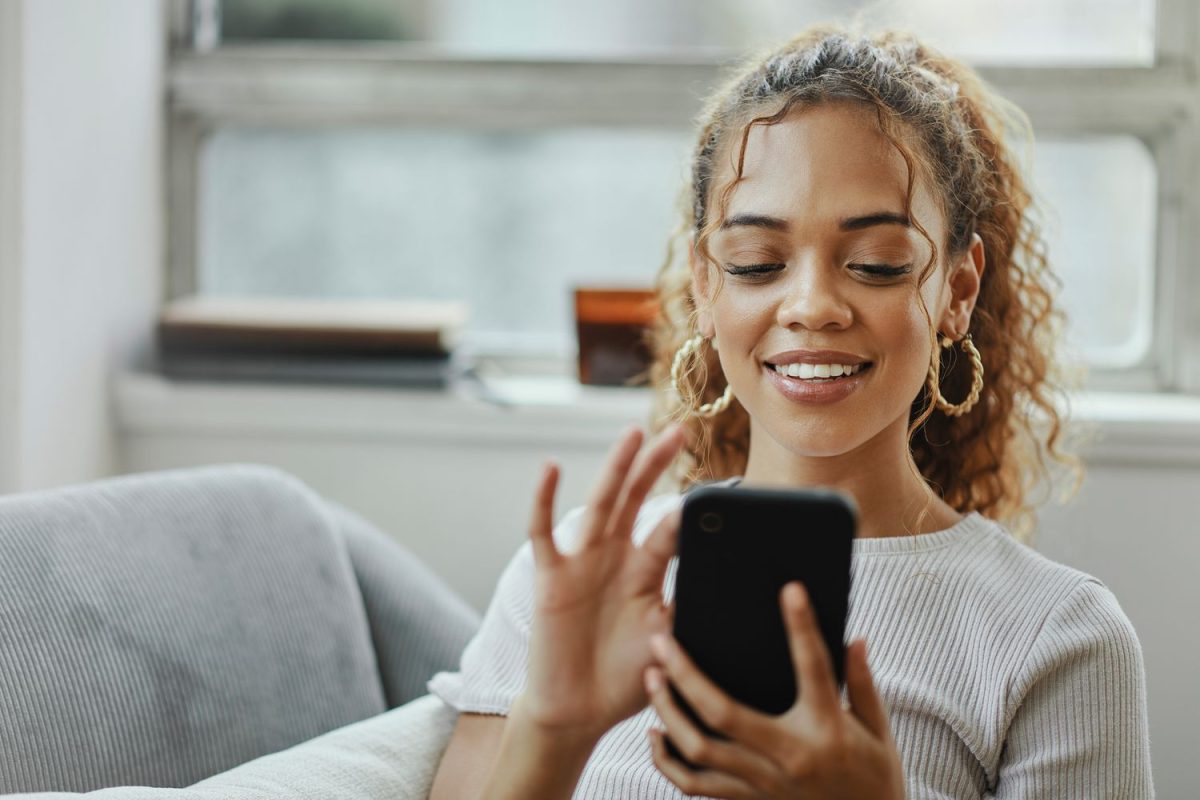 woman with phone happy good app user journey