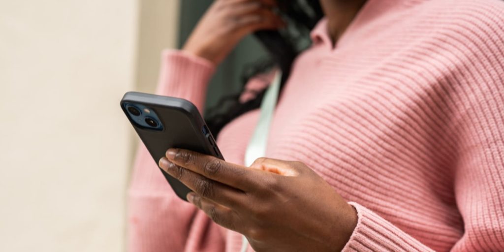 AI-Powered App in hands of a black woman