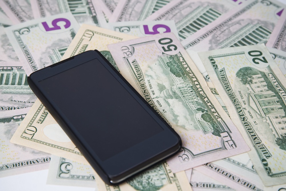 phone and money dollars
